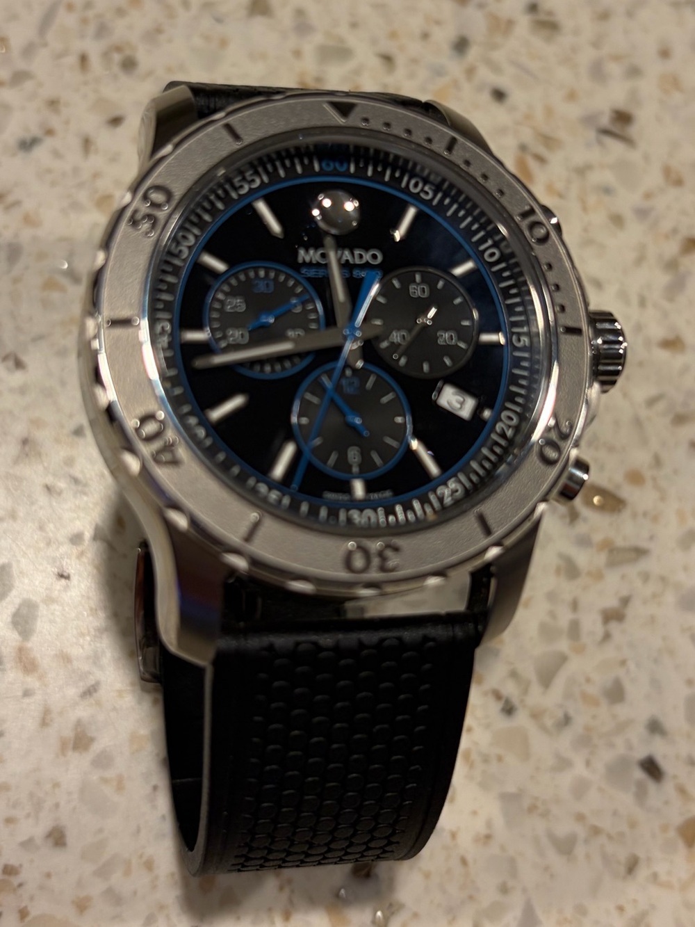 Movado Black Dial Watch with Blue Accents and Silver Case